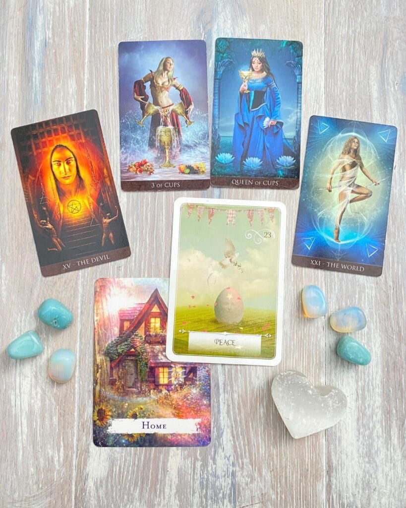 June Vibes 2026 tarot and oracle card spread with crystals and a selenite heart