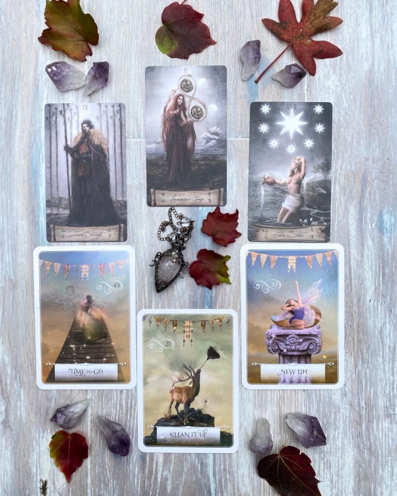 May Vibes 2026 tarot and oracle card spread with autumn leaves and crystals